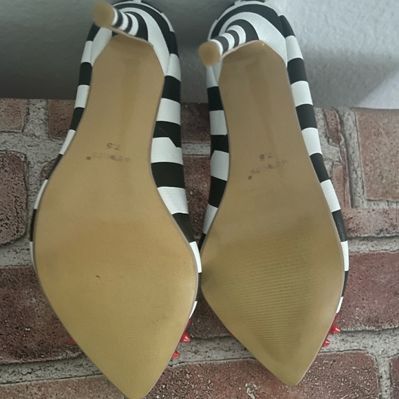 Beautiful Wet kiss spiked heels. Cruella DeVille
Bought @ boutique in LA - Picture 2 of 4